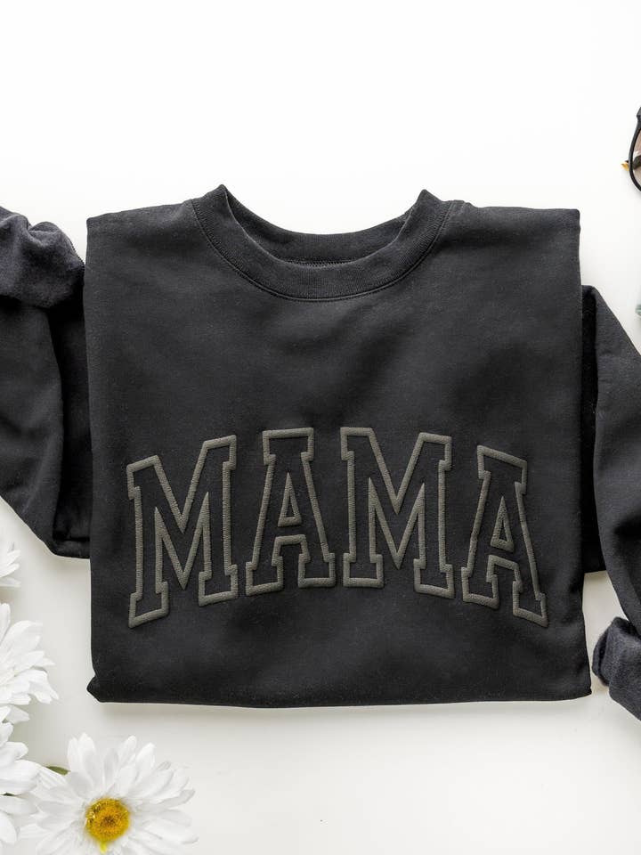 Black Embossed Mama Sweatshirt and other Purchase Wholesale mom tshirts. Free Returns & Net 60 Terms on Faire trending on Faire.