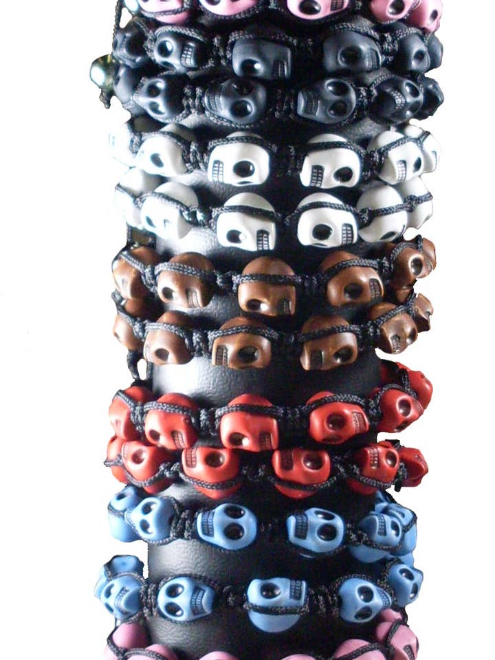 Bracelets Slider Skull sur tube - 72 pièces pour la vente par Magic Touch Corp