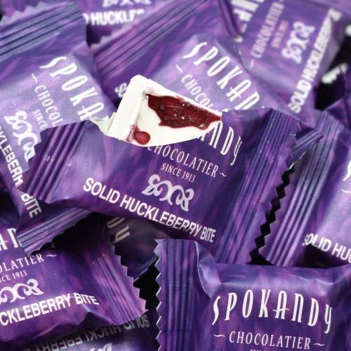 Spokandy Chocolatier - Wholesale Chocolate Covered Sweets - 1.5lbs Huckleberry Bites in a Tub1