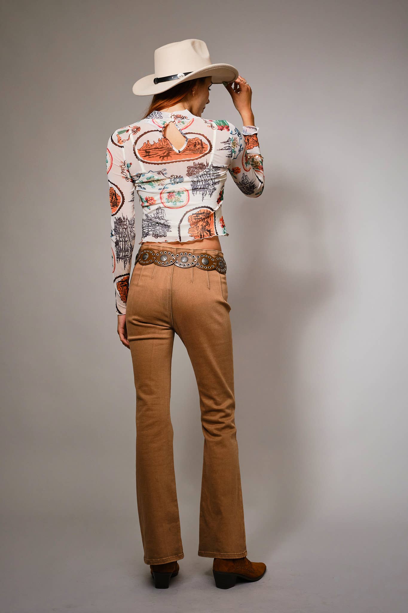 MULTI 33147T Western Motif Mesh Mock Neck Top for wholesale on Faire10