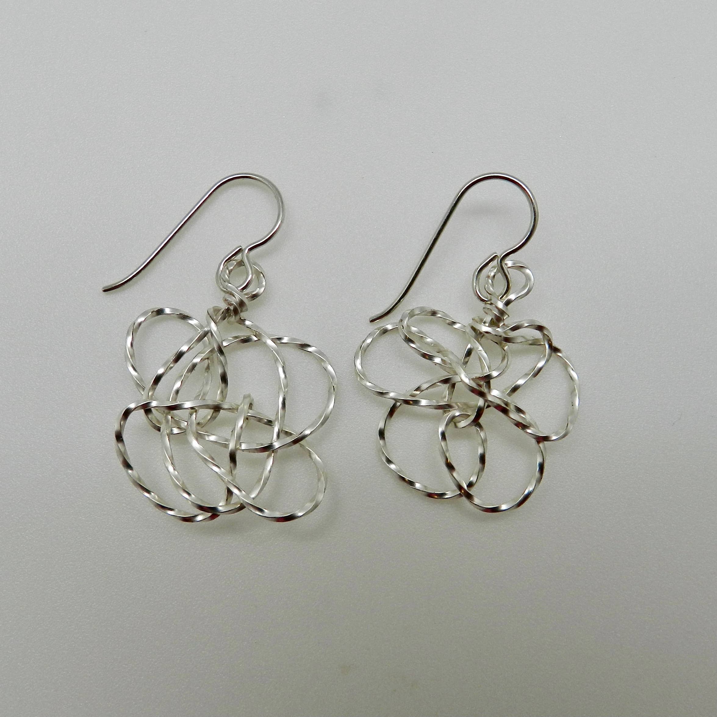 Designs by Ingrid - Vente Boucles d'oreilles pendantes - Pendentif Twist Argenté0