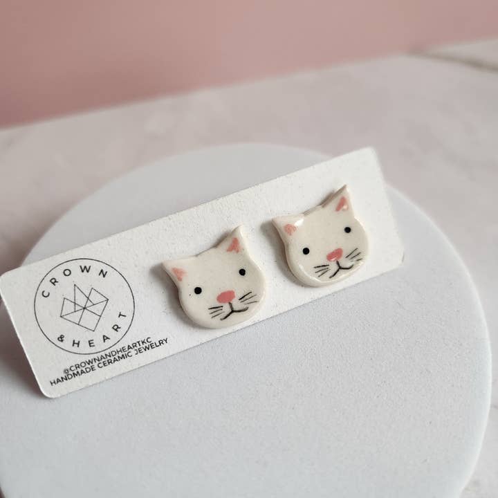 White kitty studs for wholesale by Crown & Heart