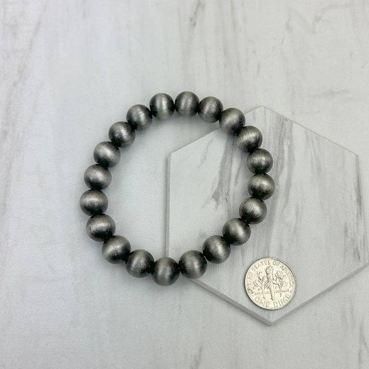 BR250120-20 Bracciale con perle Navajo in argento elasticizzato da 10 mm per la vendita all'ingrosso da parte di Western Elite Jewelry