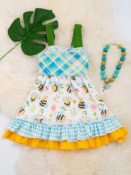 Kids Charm Online - Wholesale Dress - Kids - Plaid bee printed girls ruffle hem dress. DRG15134018 AMY