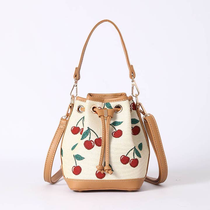 Cherry Bucket Handbag in Cream Backdrop for wholesale by Signare London