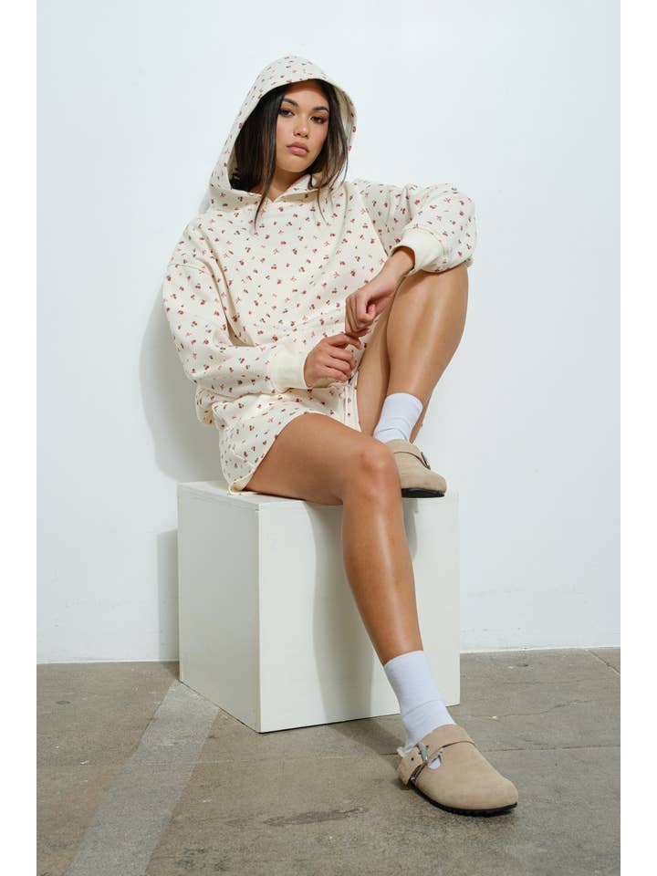 Ivory CHERRY BOW PRINT SWEATSHIRT for wholesale on Faire