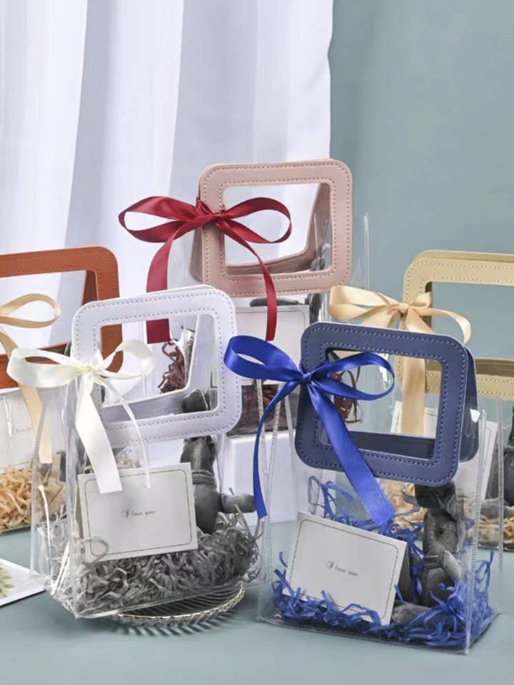 7 colors Transparent Thick PVC Gift Bag w/ square handles and other Purchase Wholesale 0 minimum. Free Returns & Net 60 Terms on Faire trending on Faire.