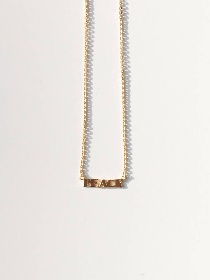 PEACE halskæde for engroshandel hos Rover & Kin