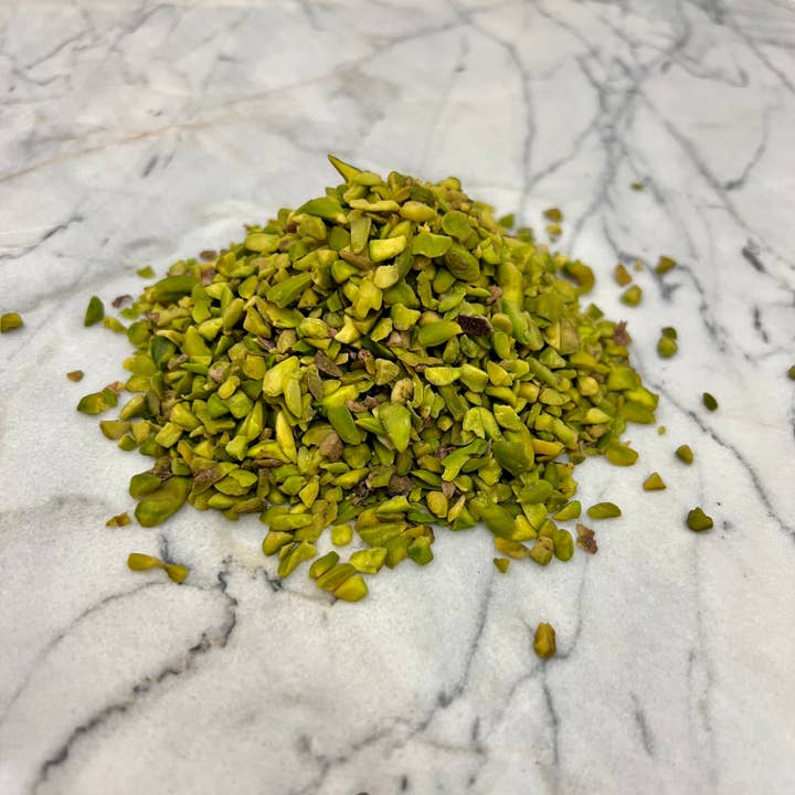 Organic chopped pistachios packet for wholesale by RAYA