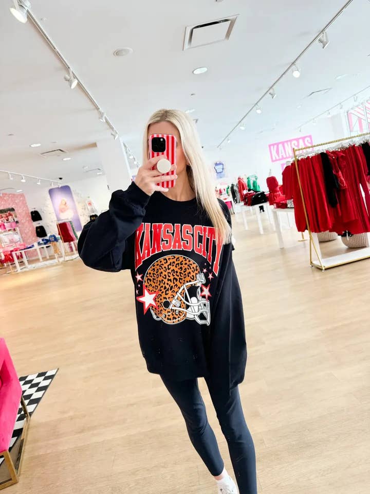 Schwarzer Leopard Footballhelm Sweatshirt-Paket für den Großhandel von Pink Dinosaur