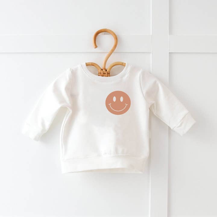Happy Face  Pocket Style Kids + Matching Adult Pullover and other Purchase Wholesale moeder dochter kleding. Free Returns & Net 60 Terms on Faire trending on Faire.