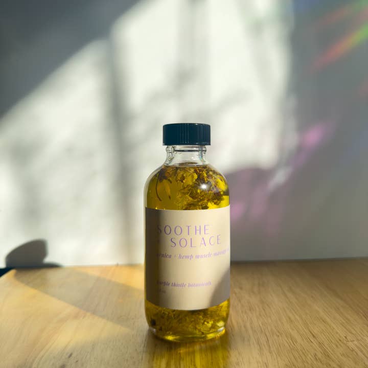 Soothe + Solace Massage Oil for wholesale by Purple Thistle Botanicals