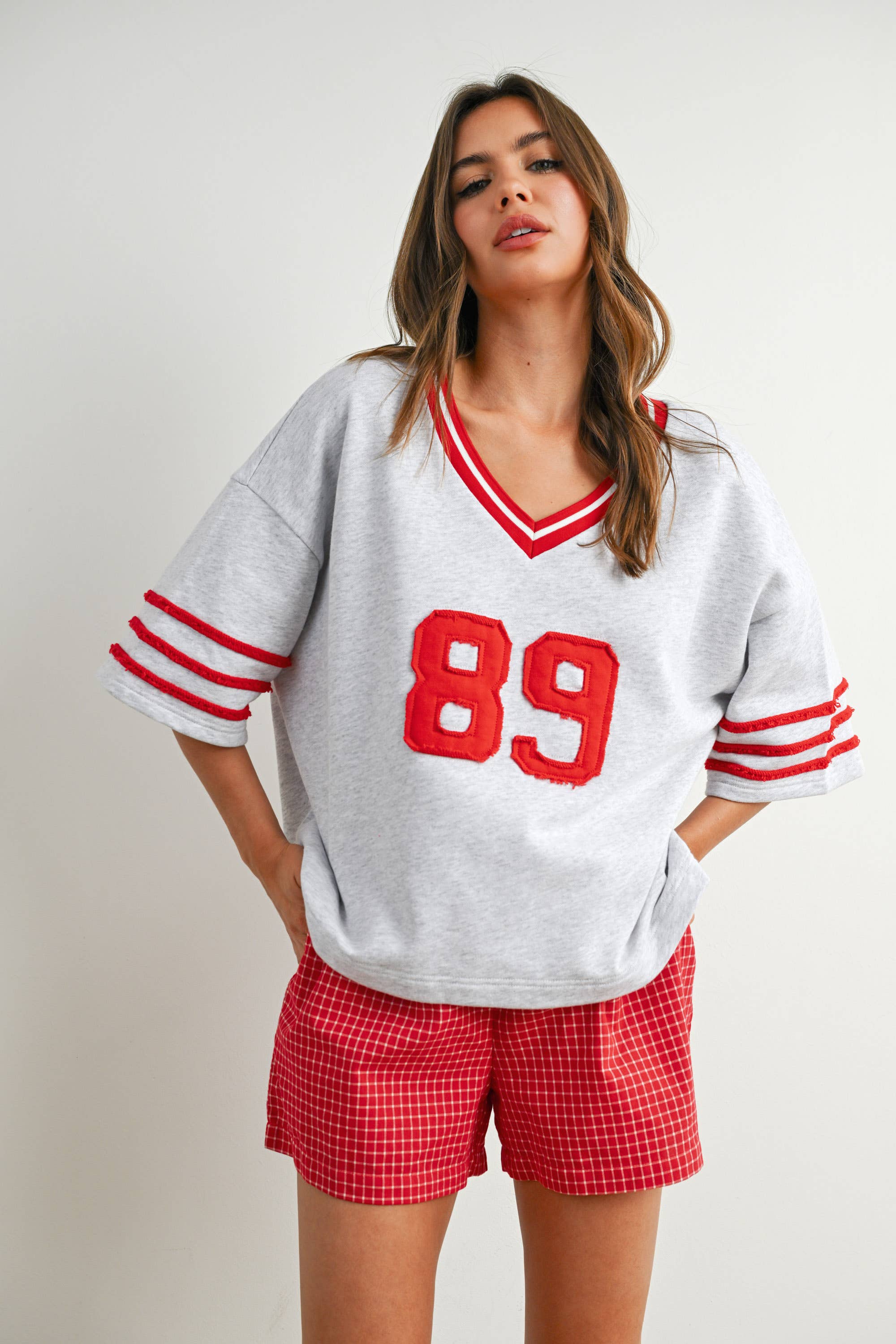 BUTTERMELON - Vendita all'ingrosso Maglietta - Donna - Maglia oversize sporty Varsity Spirit - BMT773431