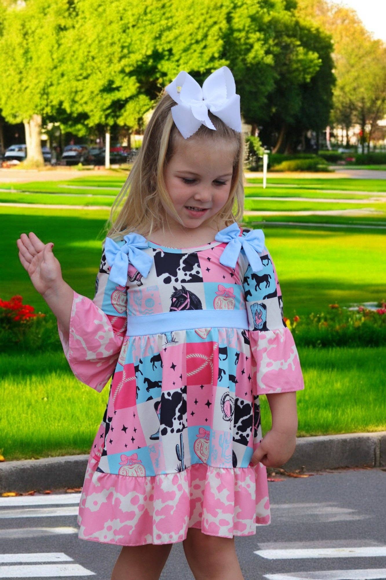 Kids Charm Online - Wholesale Dress - Kids - Beautiful wester patch printed girls dress with bows and cow printed hem.8