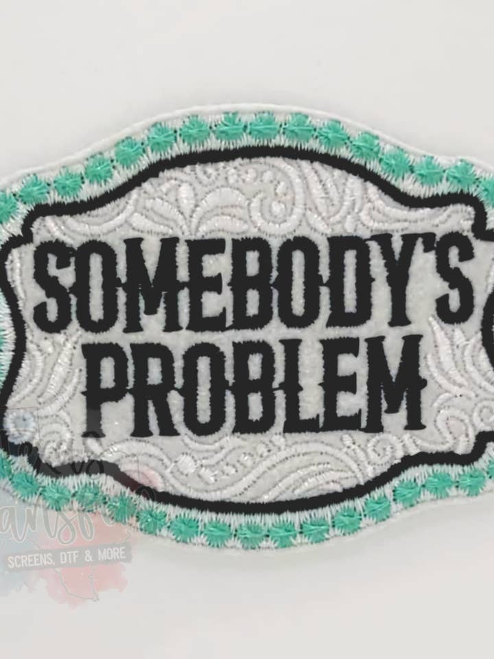 Somebody's Problem Teal Iron-On Patch for wholesale by Texas Transfers