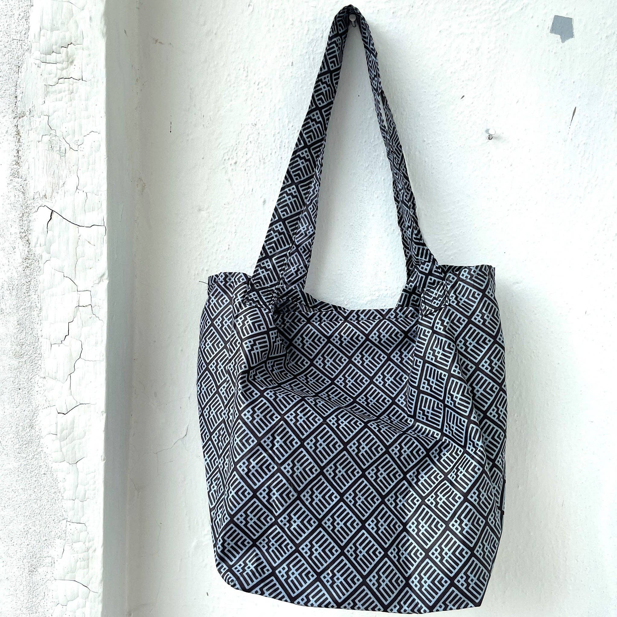 Amani ya Juu – wholesale Grocery/shopping bag – Folded Shopping Tote Buttoned1