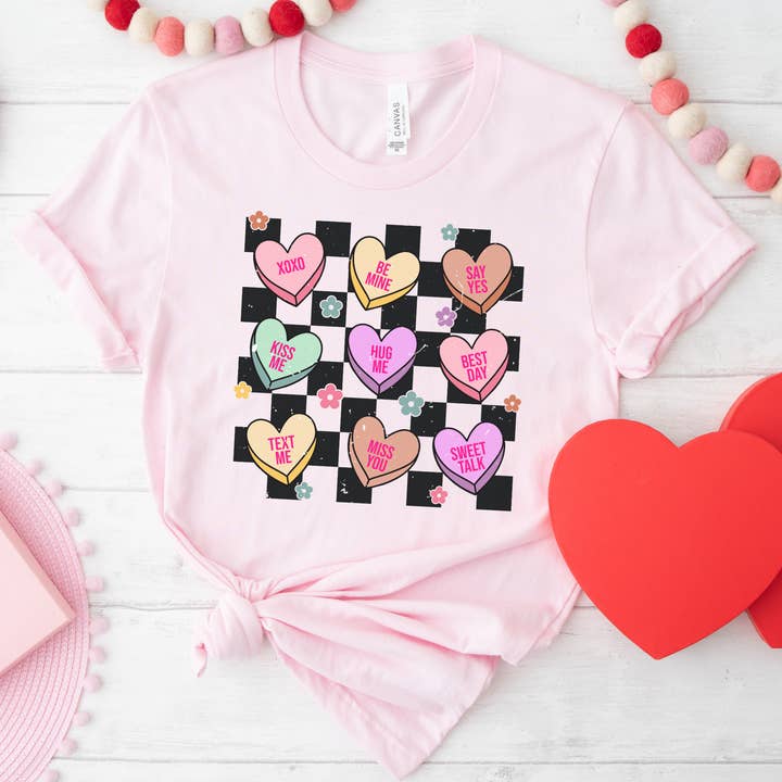 Conversation Hearts Checkerboard Valentine Graphic Tee for wholesale by Happy Tees Co