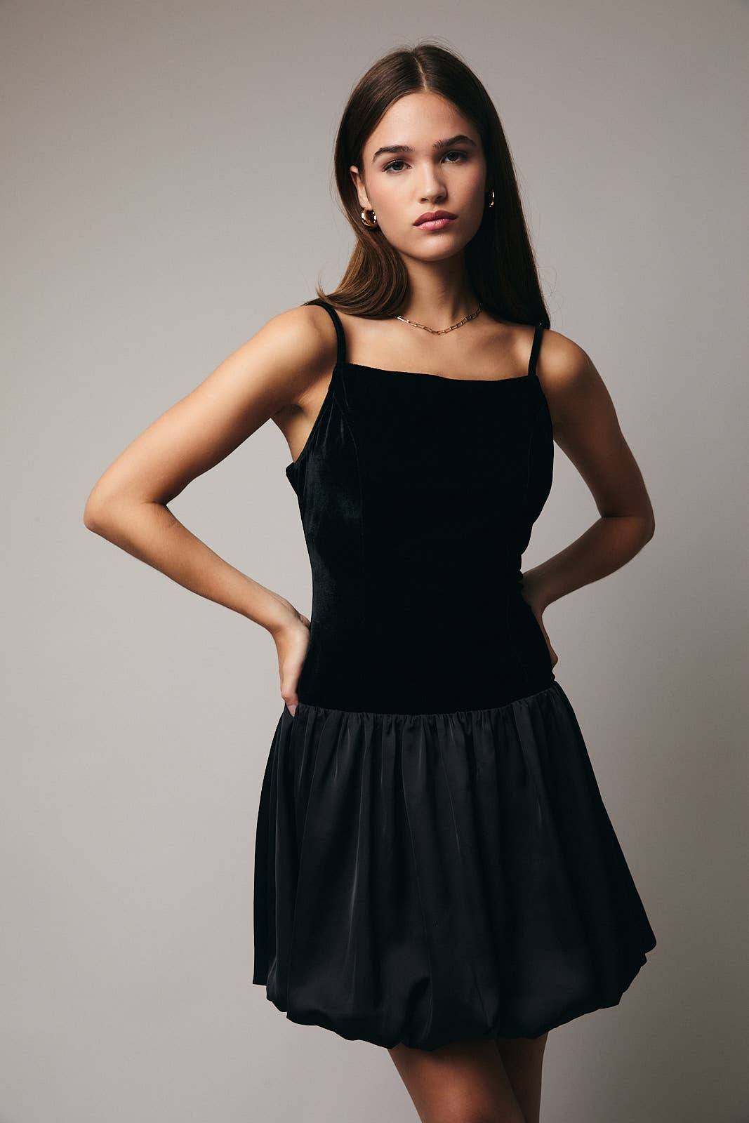 Black SLEEVELESS DROP WAIST BUBBLE HEM DRESS for wholesale on Faire1