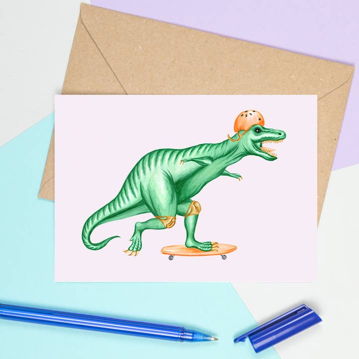 Tyrannosaurus skaboarding Greeting Card for wholesale by Sardines Studio