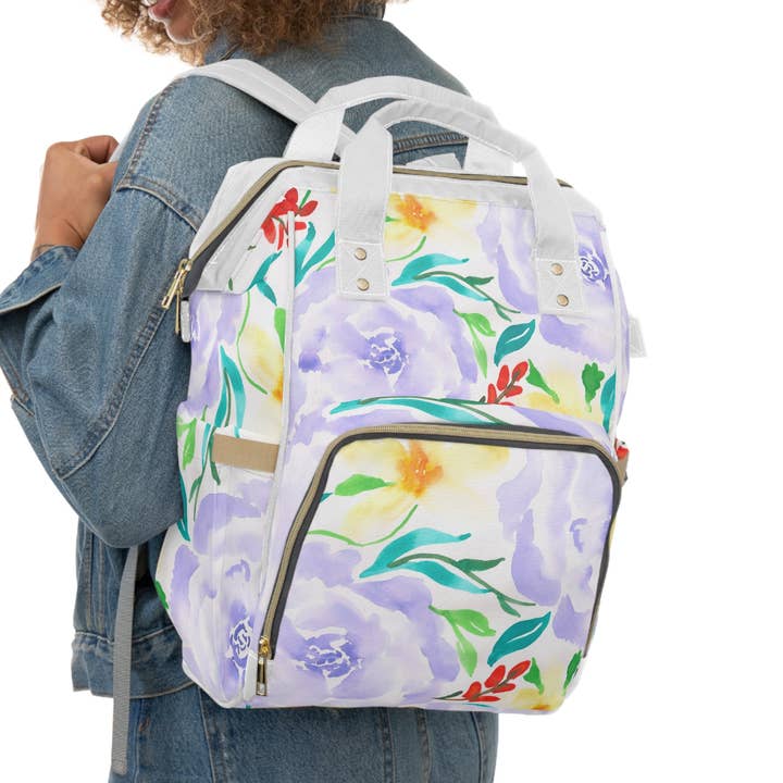 Wickelrucksack mit lebendigem Aquarell-Blumenmuster für den Großhandel von Oceane's Echo
