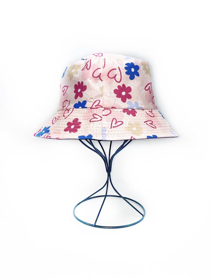 Reversible bucket hat with heart and flower print for wholesale by LINETA
