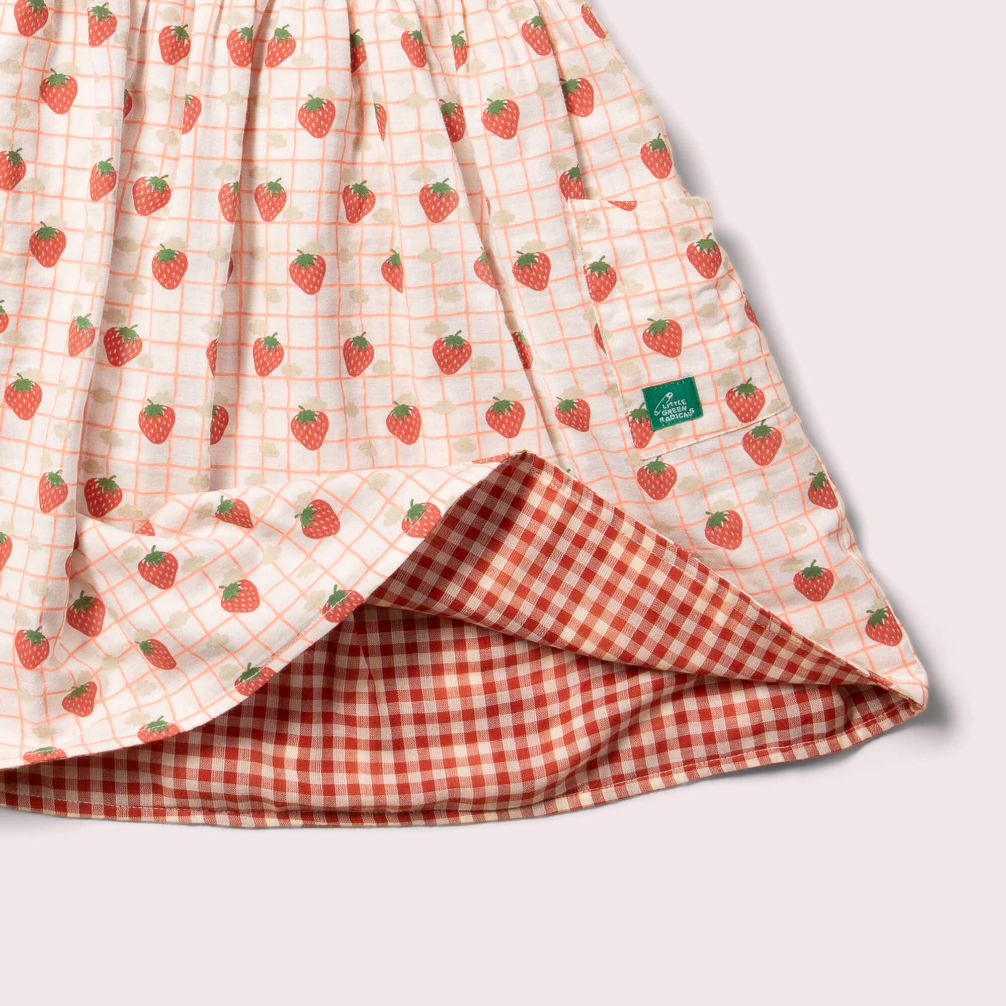 Strawberry Days Reversible Pinny Dress for wholesale on Faire6
