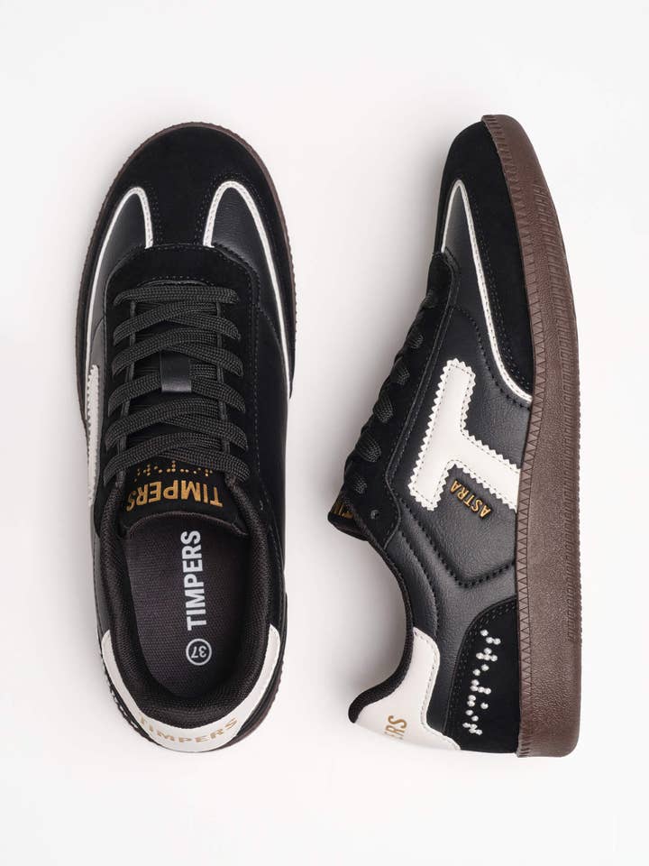 Zapatillas veganas negras diseñadas por personas con discapacidad for wholesale by Timpers