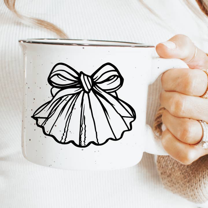 Coquette Seashell with Bow Ceramic Mug Speckled Cream 13oz for wholesale by SEA + SHELL