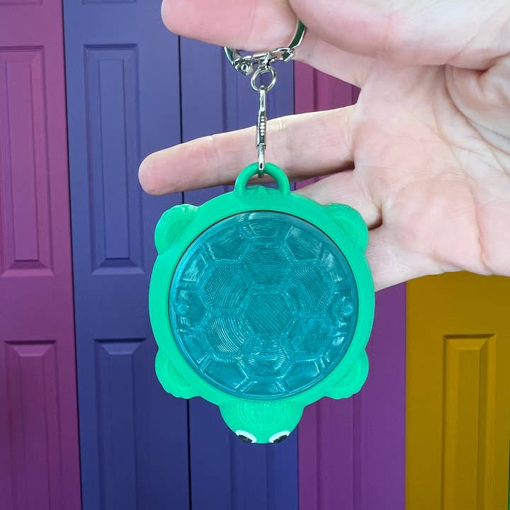 The Foxy Hipster - Wholesale Fidget toy – Kids - Turtle Childhood Sandbox Fidget Toy Clicker Keychain1