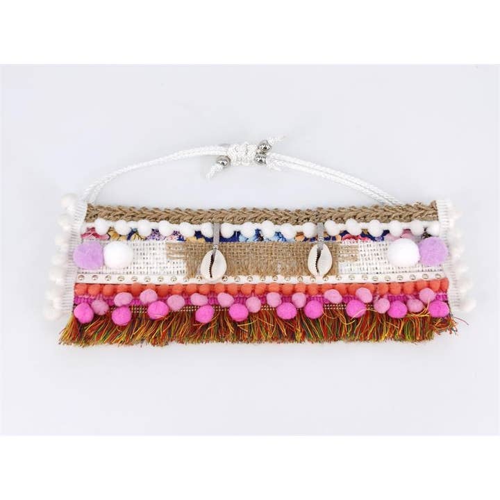 Enkelbandje in Boho-stijl - Pompon met kaurischelpen voor wholesale door Gypsea Beach Club