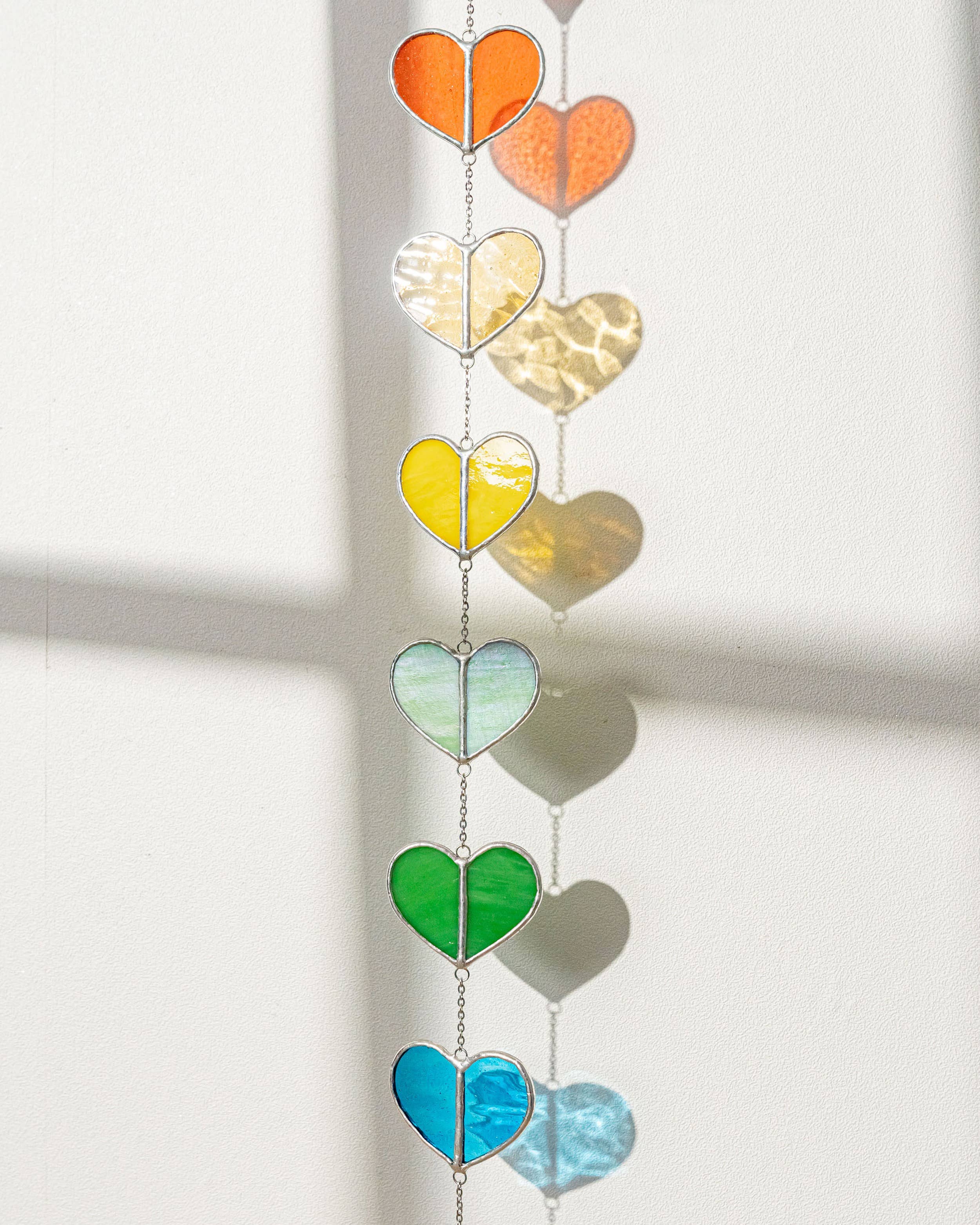 MondoBellissimo - Vendita all'ingrosso Bandierine/Ghirlande - Ghirlanda a cuore in vetro colorato F2217