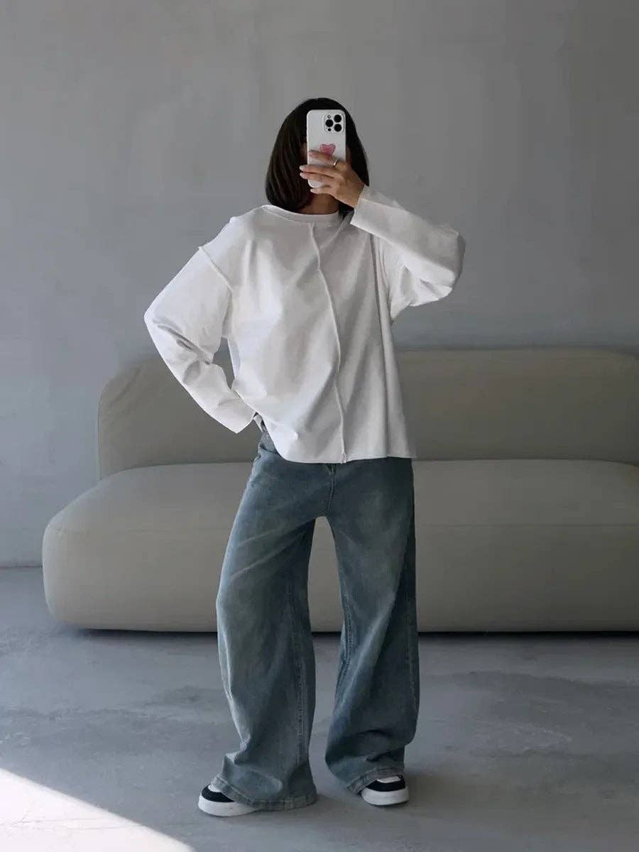 Suhkasana – wholesale T-shirt (utan tryck) – Dam – Avslappnad löst sittande bomullströja med långa ärmar och slitna detaljer.5