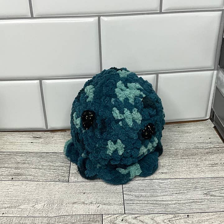 Octopus plush with crochet eyes for wholesale by Kawaii Kat Studios