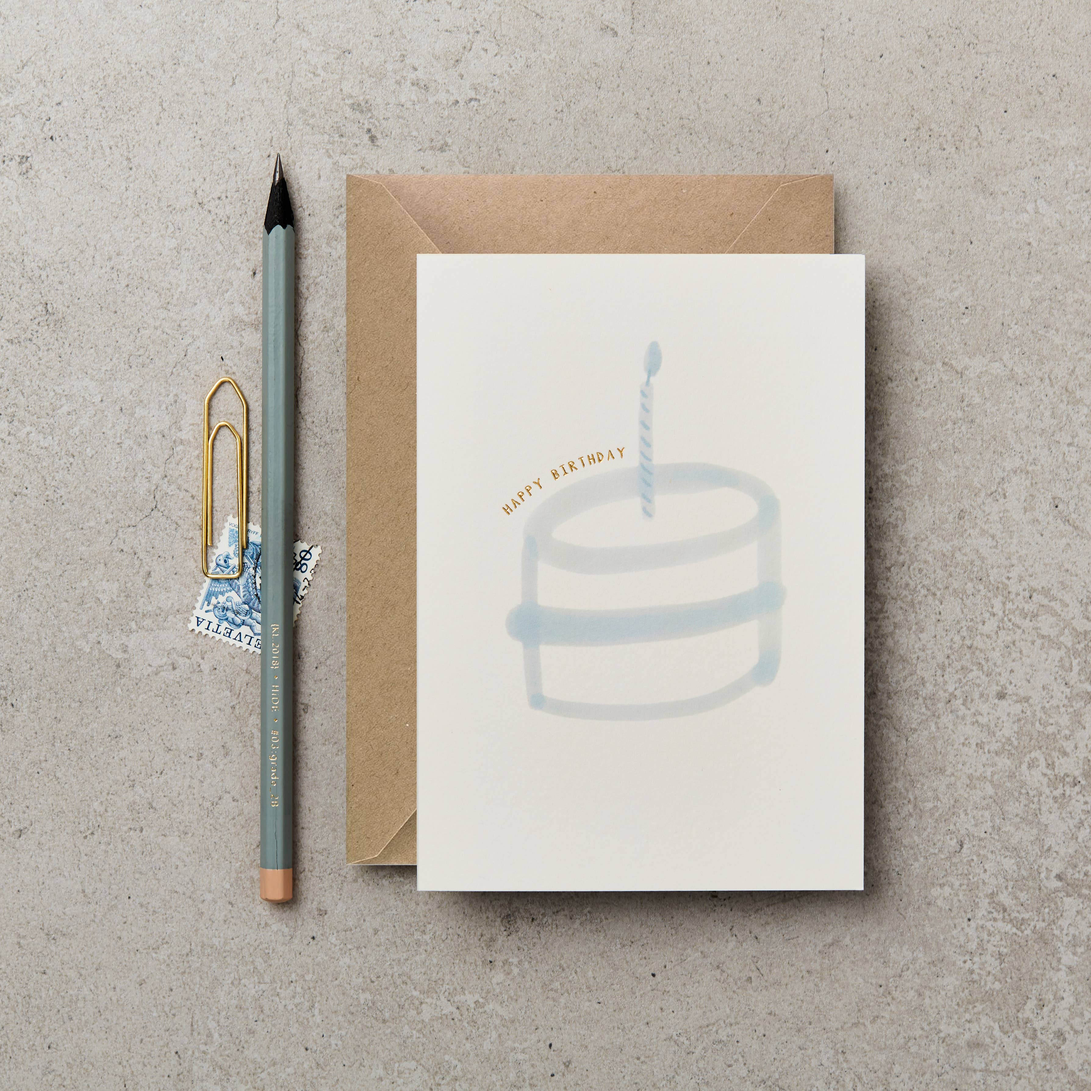 Katie Leamon – wholesale Födelsedagskort – Grattis på födelsedagstårta blått hälsningskort