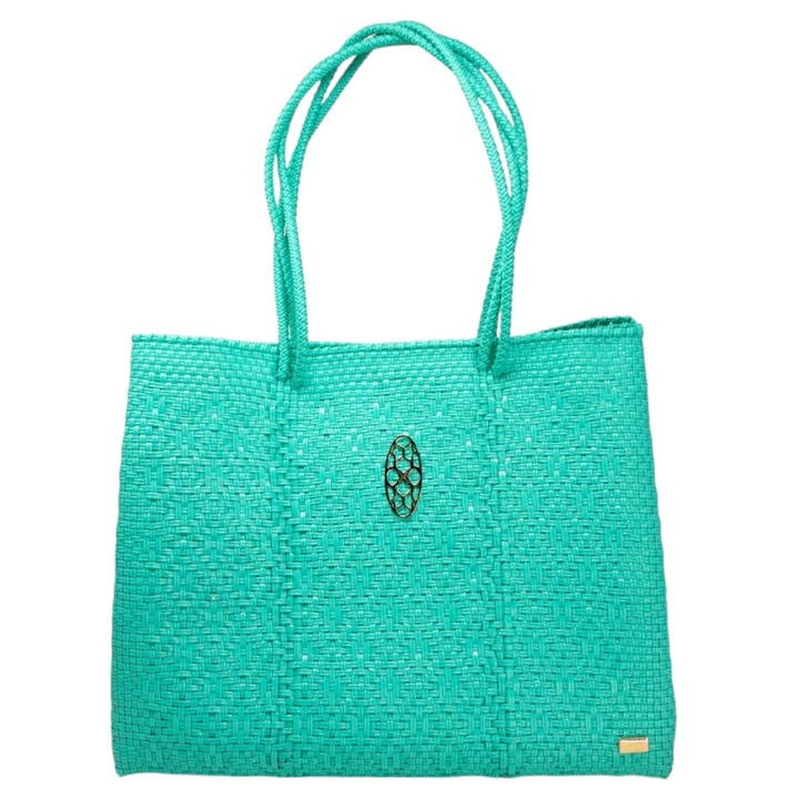 REISETASCHE IN AQUAGRÜN MIT CLUTCH für den Großhandel von Lola's Bag by Georgina Herrera