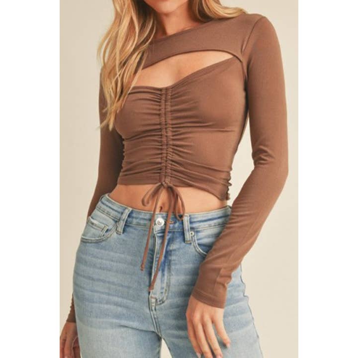 Haut découpé à manches longues et fronces sur le devant de la poitrine pour la vente par UP CLOTHING