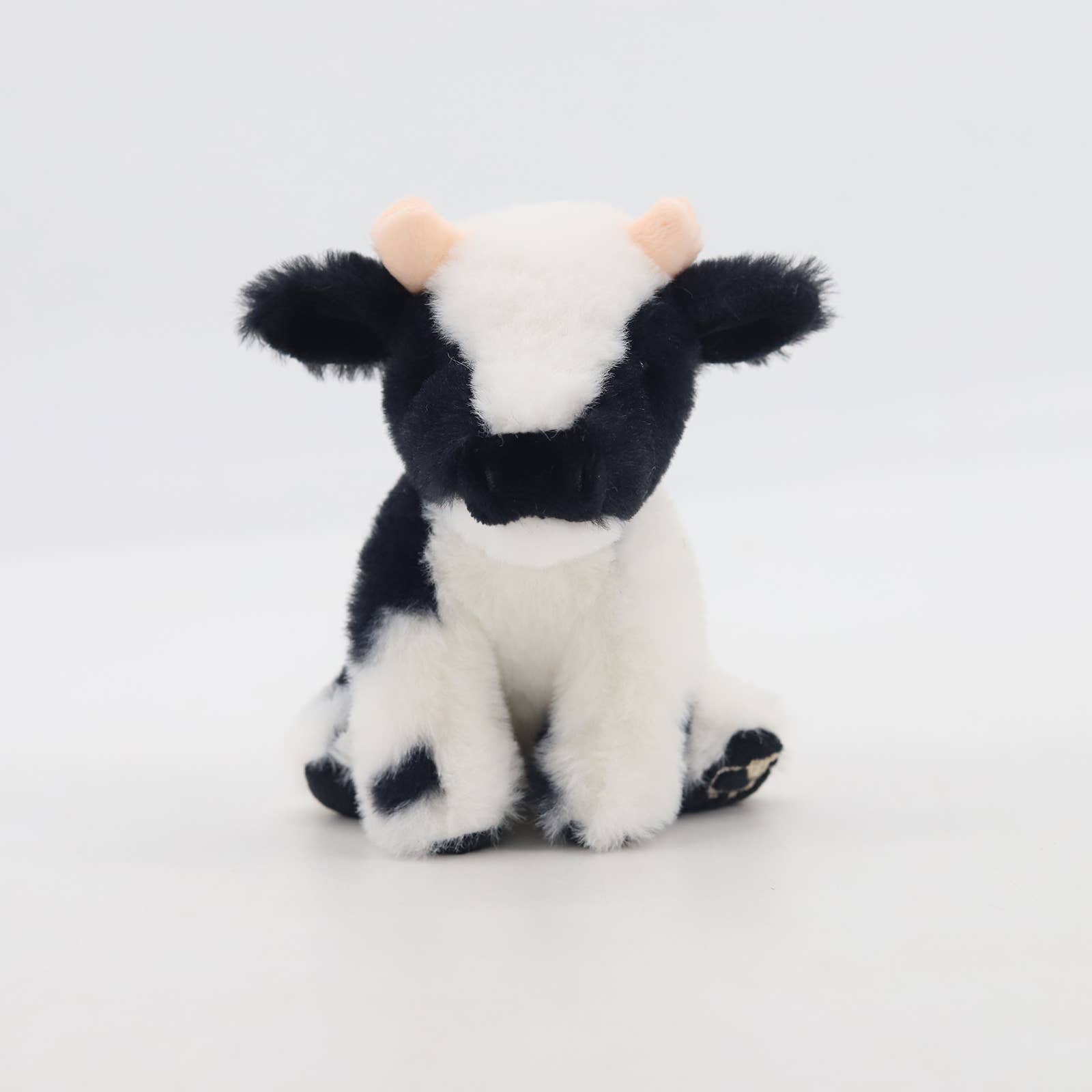 Jomanda Soft Toys & Accessories - Vendita all'ingrosso Peluche - Bambini e neonati - Peluche morbido a forma di mucca da latte bianco e nero (11 cm)