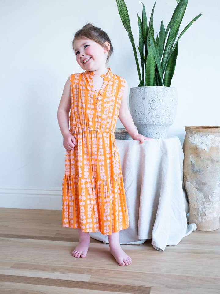 KIDS Sienna Kleid - orange mit pinken Blättern für den Großhandel von Roma Label