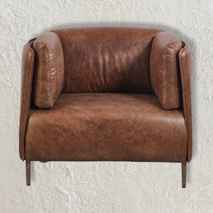 Andrea: Tub Chair, tan leather for wholesale by Bisque Traders
