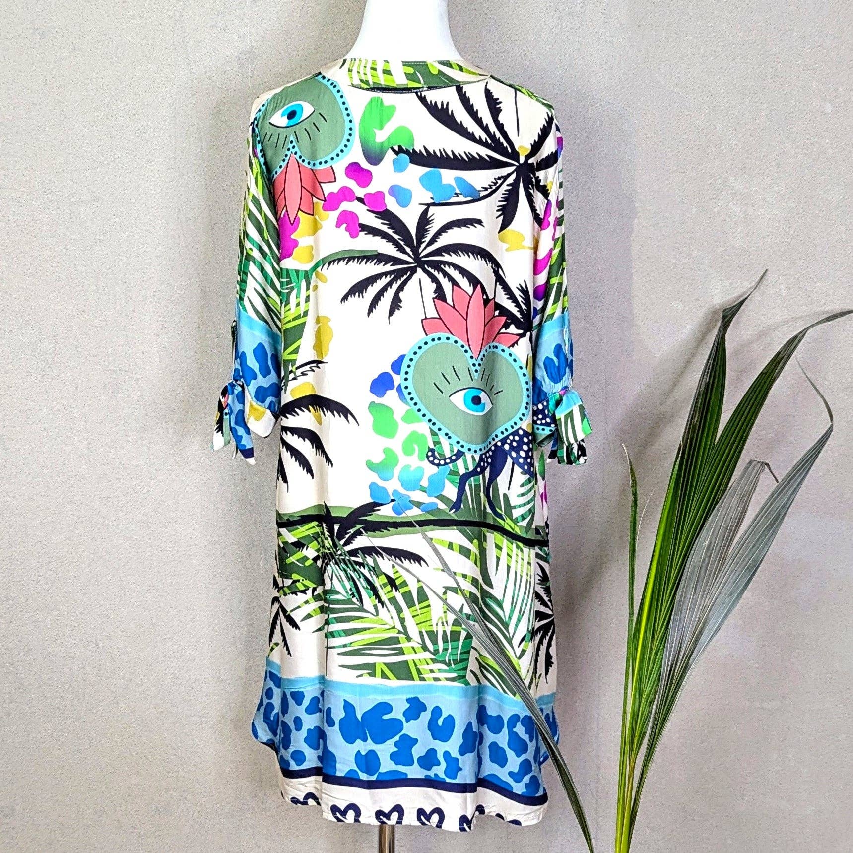 Tempest Designs – wholesale Dress – Women's – Viscose satin feel palms, eyes and animal fusion print half button down dress with pockets (M-L)1