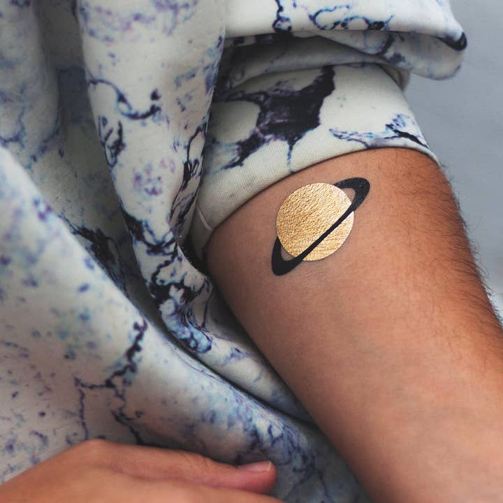 Tatouage GOLDEN PLANET (lot de 2) pour la vente par Tattoonie