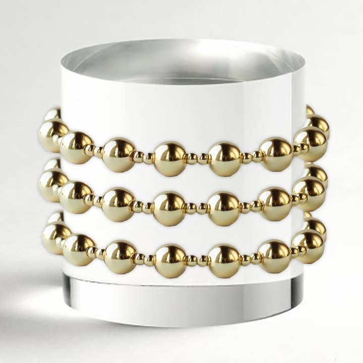 Gouden kralenarmbanden - Duo, glad, rekbaar voor wholesale door Lenny & Eva