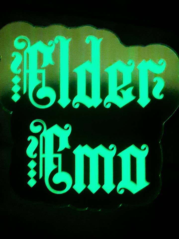 Autocollant Elder Emo qui brille dans le noir pour la vente par Unsupervised Art