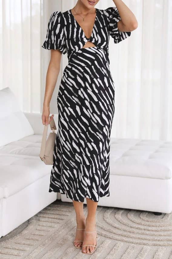 Rosa Clothing - Wholesale Dress - Women's - zebra print plunge twist front cutout puff sleeve dress7