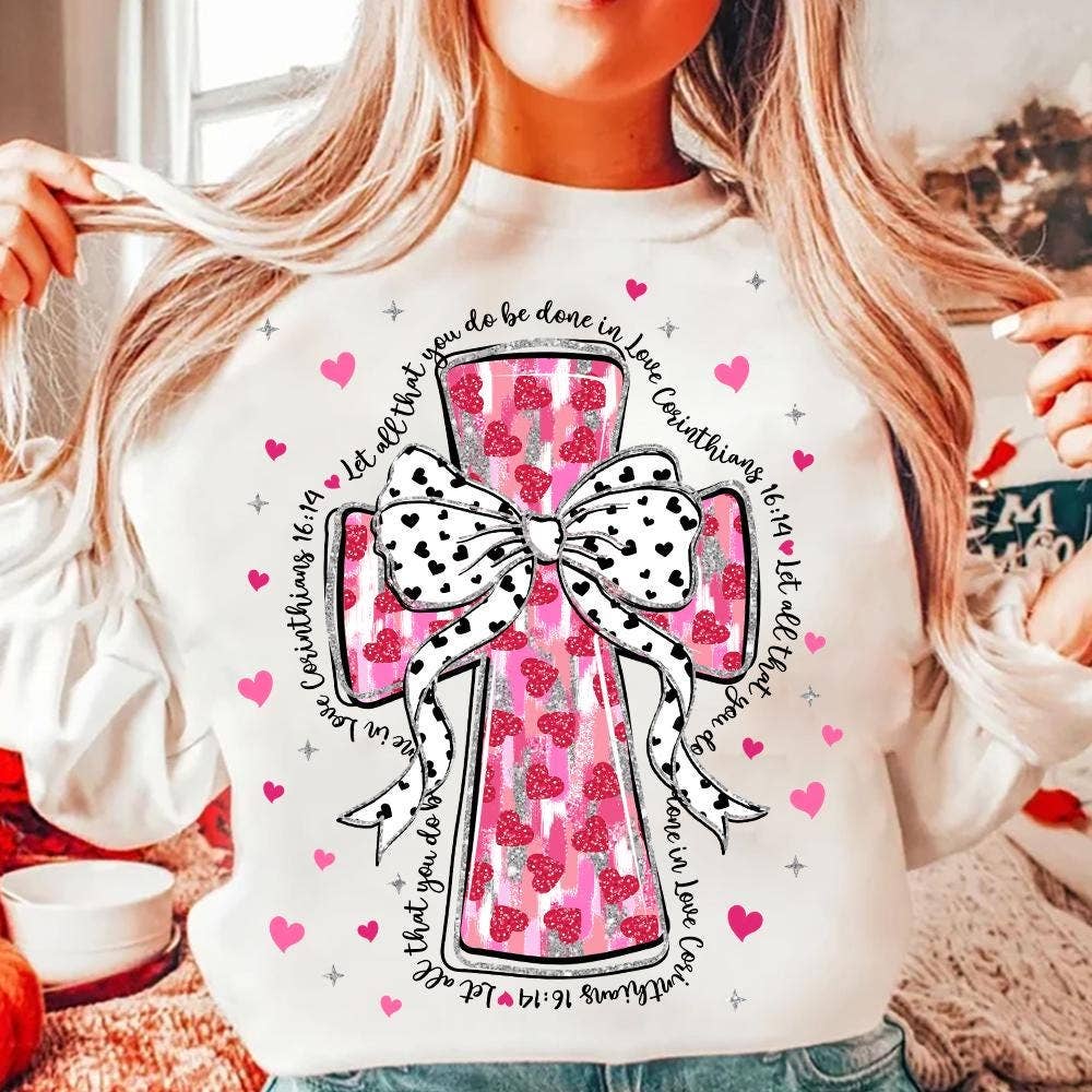 NVC Ecommerce LLC - Wholesale T-Shirt (Graphic) - Women's - Pink Brushstroke Cross Glitter Tee, Jesus valentine Sweater