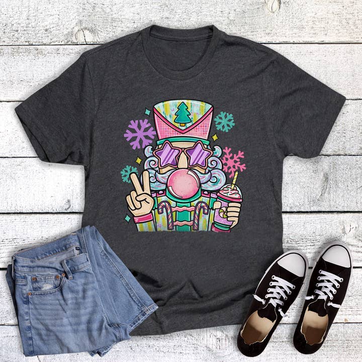 Christmas Whimsical Peace Nutcracker Graphic Tee for wholesale by Dust and Roots
