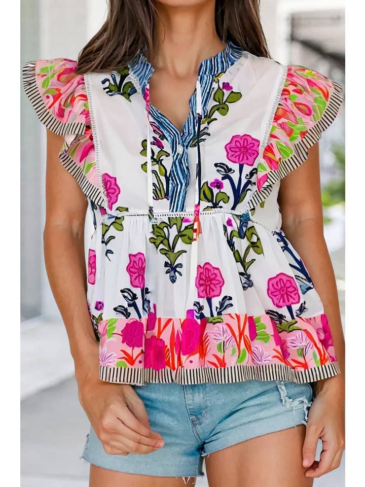 As shown Sassy Floral Print Tie Neck Ruffled Sleeve Blouse | S-XL for wholesale on Faire