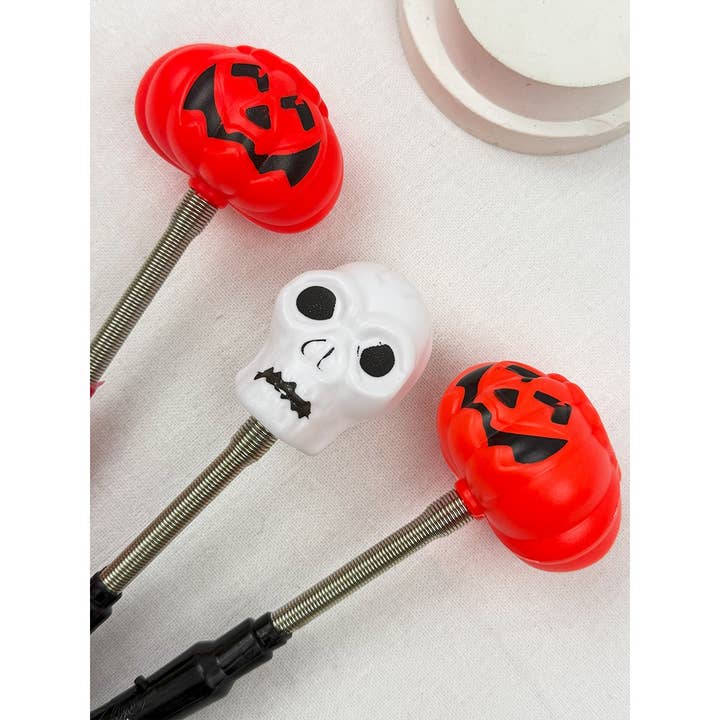 MIX COLOR Glowing Pumpkin Skull Shaking Stick for wholesale on Faire6