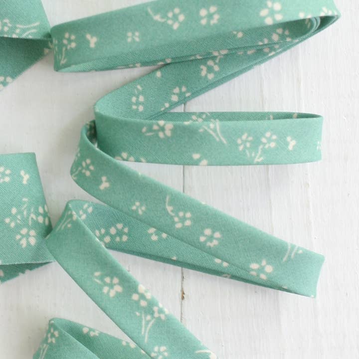 Bessie Pearl Binding Co - Wholesale Craft Supplies - 1/2" Double Fold Bias Binding - Floret Floral, Teal, Spool
