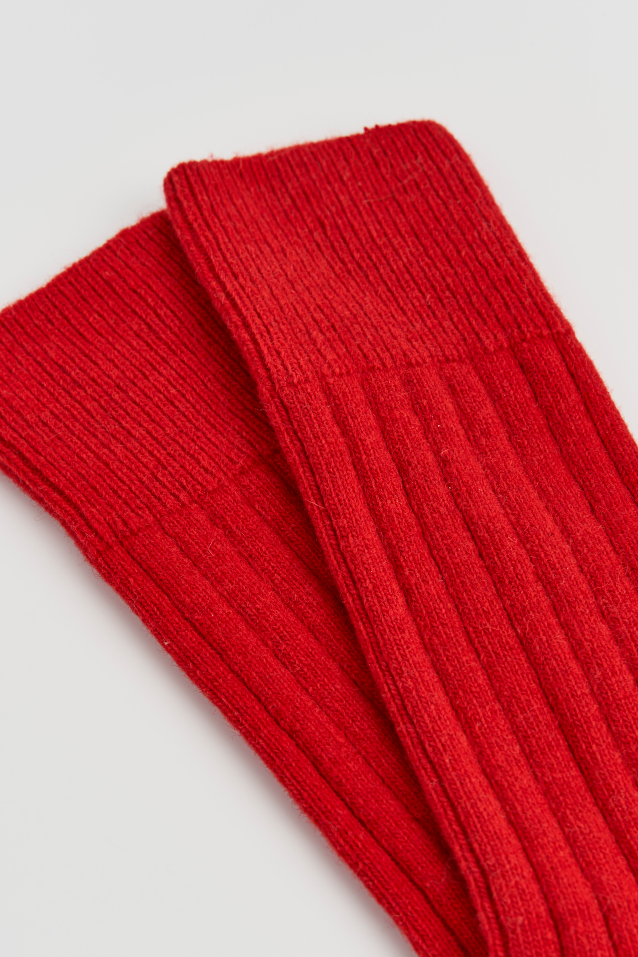 Postbox Red Merino Bed Socks for wholesale on Faire2